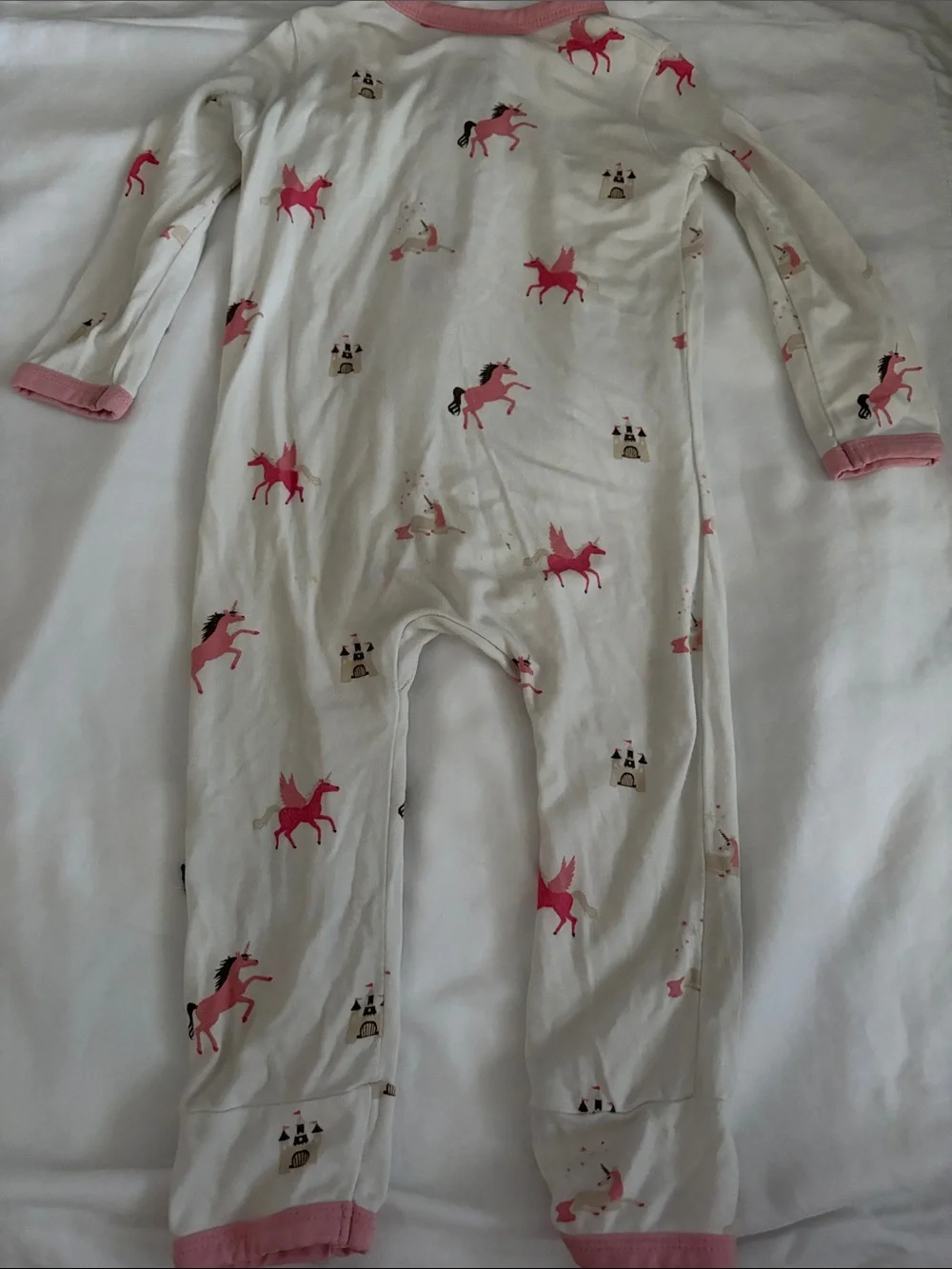 Kyte Baby pink and white unicorn castle print zippy